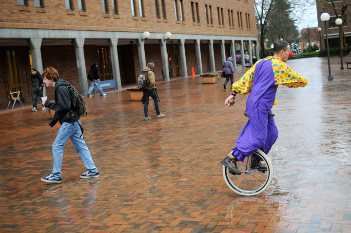 Western facilities management employee Joe Meyers recreates the psychology experiment of a unicycling clown, for a TV news station, Monday, January 24, 2011. Photo by Daniel Berman/www.bermanphotos.com
