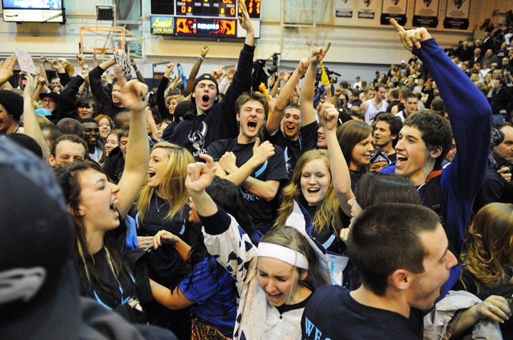 Western Washington University fans celebrate after a 66-62 victory over rival Central Washington University Wednesday, Feb. 16 at Carver Gym in Bellingham, Wash. Photo by Daniel Berman/www.bermanphotos.com