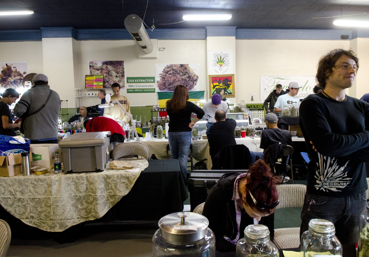 Patients and vendors at the NW Cannabis Market in Seattle, Washington mingle and donate medical cannabis and edibles to each other May 22, 2012. The market serves a few hundred medical marijuana patients on a daily basis. Photo by Daniel Berman